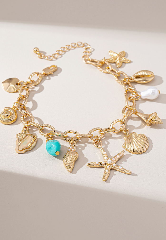 Coastal Charm Bracelet With Shells And Starfish